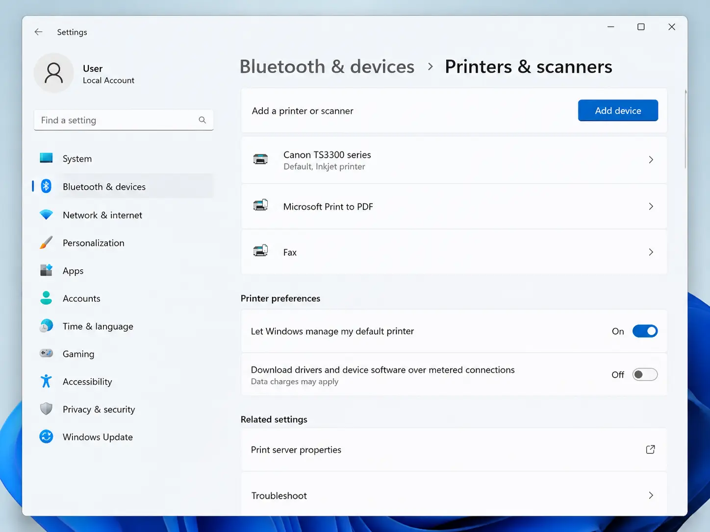 Open windows Settings → Bluetooth & devices → Printers & scanners